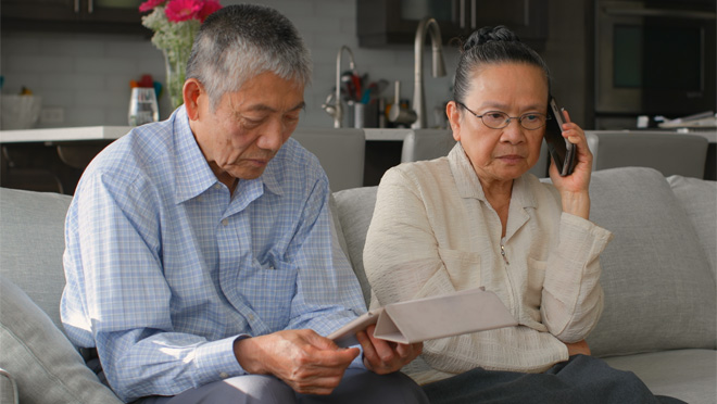 Couple reporting a scam.