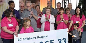 Power Pioneers and BC Hydro donating cheque to BC Children's Hospital Miracle Campaign